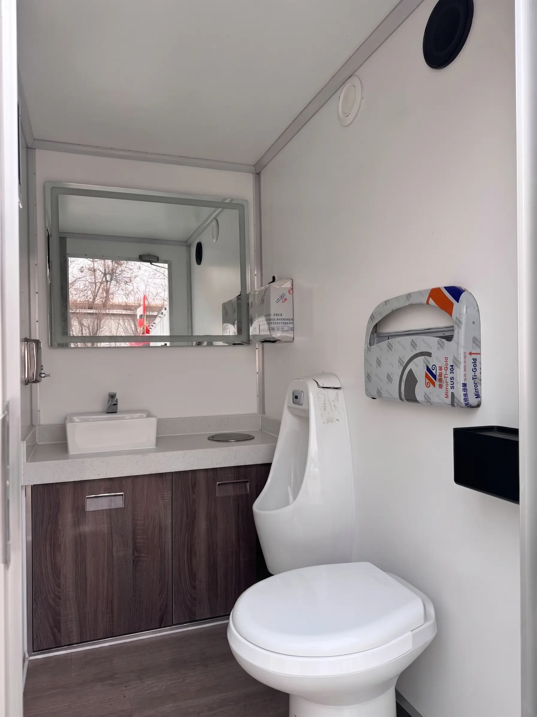 Luxury Loos restroom trailer rental in Tulsa, Oklahoma — interior with toilet and vanity